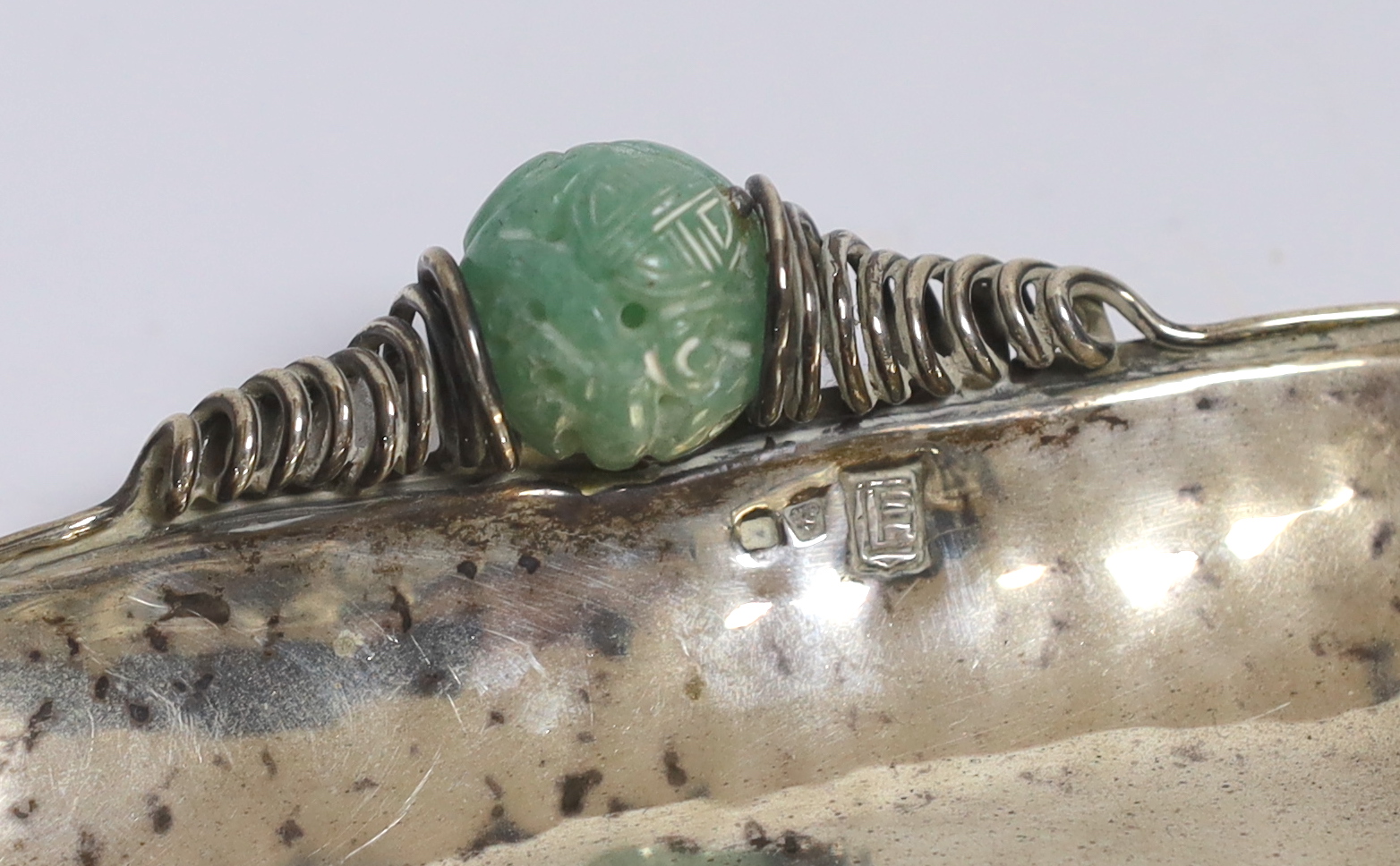 A Chinese white metal and bowenite jade mounted dish, 14.7cm, gross 3.7oz.
